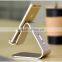 Micro suction aluminum mobile phone holder/stand for all phones and macbook