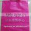 Red design 50 micron plastic bag with handle