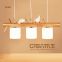 Nordic bird table restaurant creative personality led chandelier three table dining table simple modern solid wood lamps
