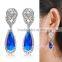 Party wear jewelry blue stone golden earring designs for women