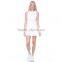 Breathable white skort mesh tennis wear for lady fitted tank top and pleated mini skirt