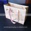 Custom Luxury Clothing packaging Paper shopping bag with ribbon handle