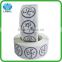 Round adhesive paper stickers on roll