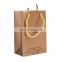 Black embossed gold logo paper shopping bag with handle