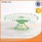 Colorful decorative pattern on glass milk cake stand