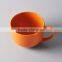 Colorful glazed ceramic soup bowl with handle