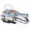 Hand-held pneumatic strapping machine