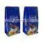 Wholesale stand up quad seal aluminum foil bag custom printed flat bottom packaging valve bag for ground coffee