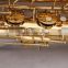 gold lacquer surface baritone saxophone Eb musical instruments