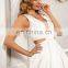 Cut out sleevless white wedding gown for bride