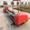 Concrete slip form paver laying machine
