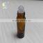 10ml 1/3 oz amber glass roll on bottle with black plastic cap