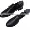 black plastic adjustable shoe stretcher
