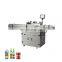 Labeling machine for amber glass bottles, plastics and other materials