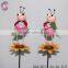 Iron garden stakes of metal beetle standing on kettle sticks for garden decoration