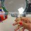 Transparent frame 5X magnifying cosmetic handheld mirror