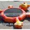 Children playing inflatable bouncing castle