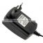 EU Plug 12V 2A Creative Switching Power Supply Converter Adapter