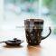 White ceramic coffee mug with dot
