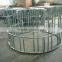 Round bale hay feeder for cattle and horse