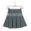 Woman candy color pleated mini skirt simple design