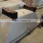 rectangular freestanding cast iron bathtub with wooden cradle