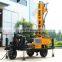 Multi-function portable wheel mounted mud/air dth drilling rig