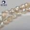 cream white 11-13mm AAA grade nucleated baroque pearls string wholesale