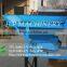 Dosing hopper with electric weight