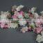 Artificial colourful cherry blossom garland for window display