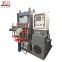 Vertical rubber compression molding machine with vacuum pump
