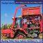 Corn harvester modified with triangular track wheels for anti slip in flooded areas