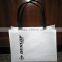 Custom non woven bag price white fabric black handles with printed logo