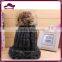 Acrylic thick needle knitted slouchy beanie with fur pom
