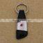 Wholesale free deisgn black genuine / pu leather keychain with embossed logo