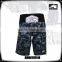 Lily flower print with reflective logo surf shorts