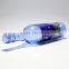 Blue clear glass wine bottle witn long neck beer bottle