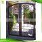arched new wrought iron grill double window front entry door designs