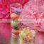 Cylinder shaped clear containers with slip over lids sized to hold gumballs