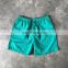 Wholesale stock beach shorts, polyester men running shorts mesh lining shorts for men with letter printing for promotion/
