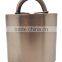 Cow bell in silver plated with leather strap attached
