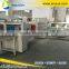 Automatic shrink wrapping machine with shrink tunnel