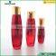 30/110/135ml red glass clear lotion cosmetic bottle with pump                        
                                                                                Supplier's Choice