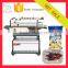 Automatic continuous vacuum sealing machine with gas flush