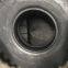 Two busy tires 12.5/80-18 16.9-28 vacuum tire loader R-4