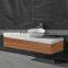 white matte resin basins, modern art above counter top basin