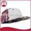Short brim snapback hat with an adjustable plastic snapback strap closure