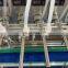 Automatic Water Liquid Bottle Filling Machines Magnetic Pump Corrosive Liquid Filler With Conveyor Belt