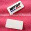 Clean white rubber label for staff clothes