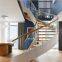 Arc / curved staircase with blue glass steps stainless steel stringer rod railing glass stair